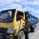 Plt. Asisten I Pemkab Natuna Turut Bagikan Masker bersama TNI-POLRI
